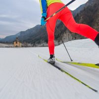 Particular of Cross-country skiing classic technique  practiced by woman